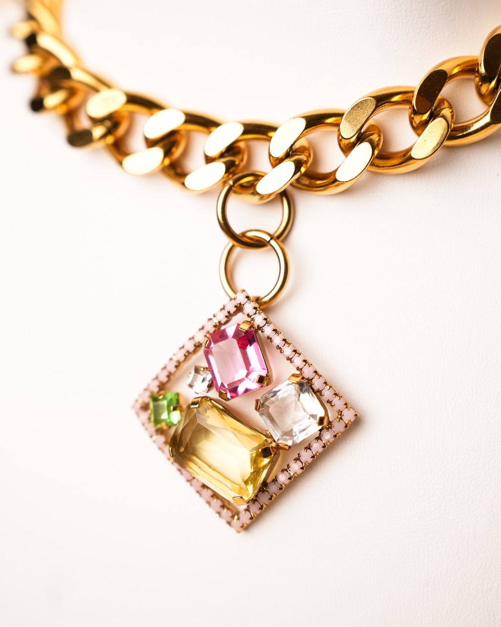 Medici — multi-coloured crystal pendant in a brass mount on a gold chain