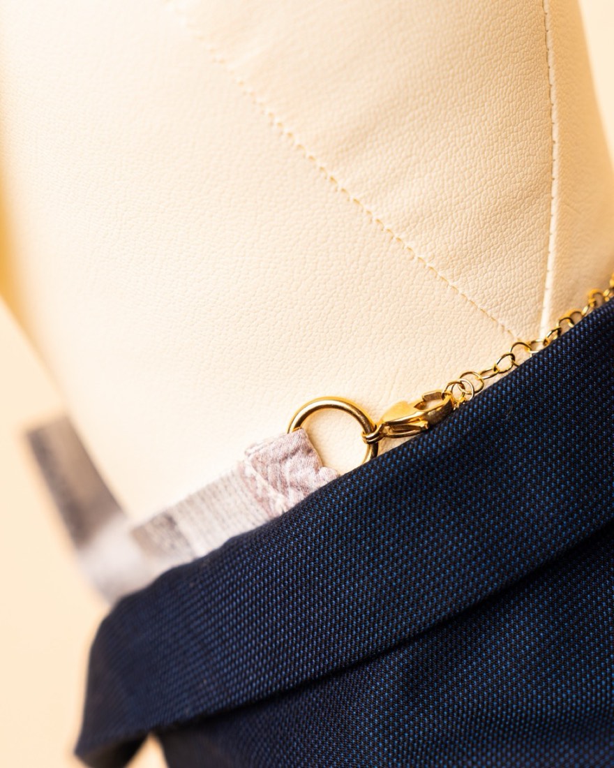 Biella Bow — clasp and chain detail