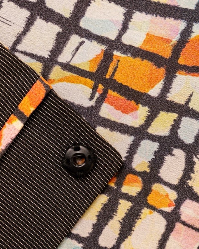 Maza — hidden snap and piping detail