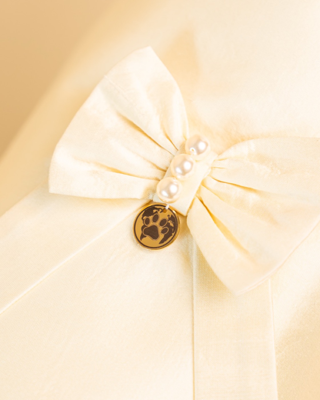 Sevilla — bow with crystal pearls and CosmoPaw logo tag